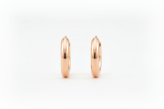 Rose gold huggie hoops - side profile