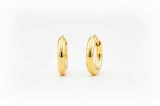 Yellow gold huggie hoops - side profile